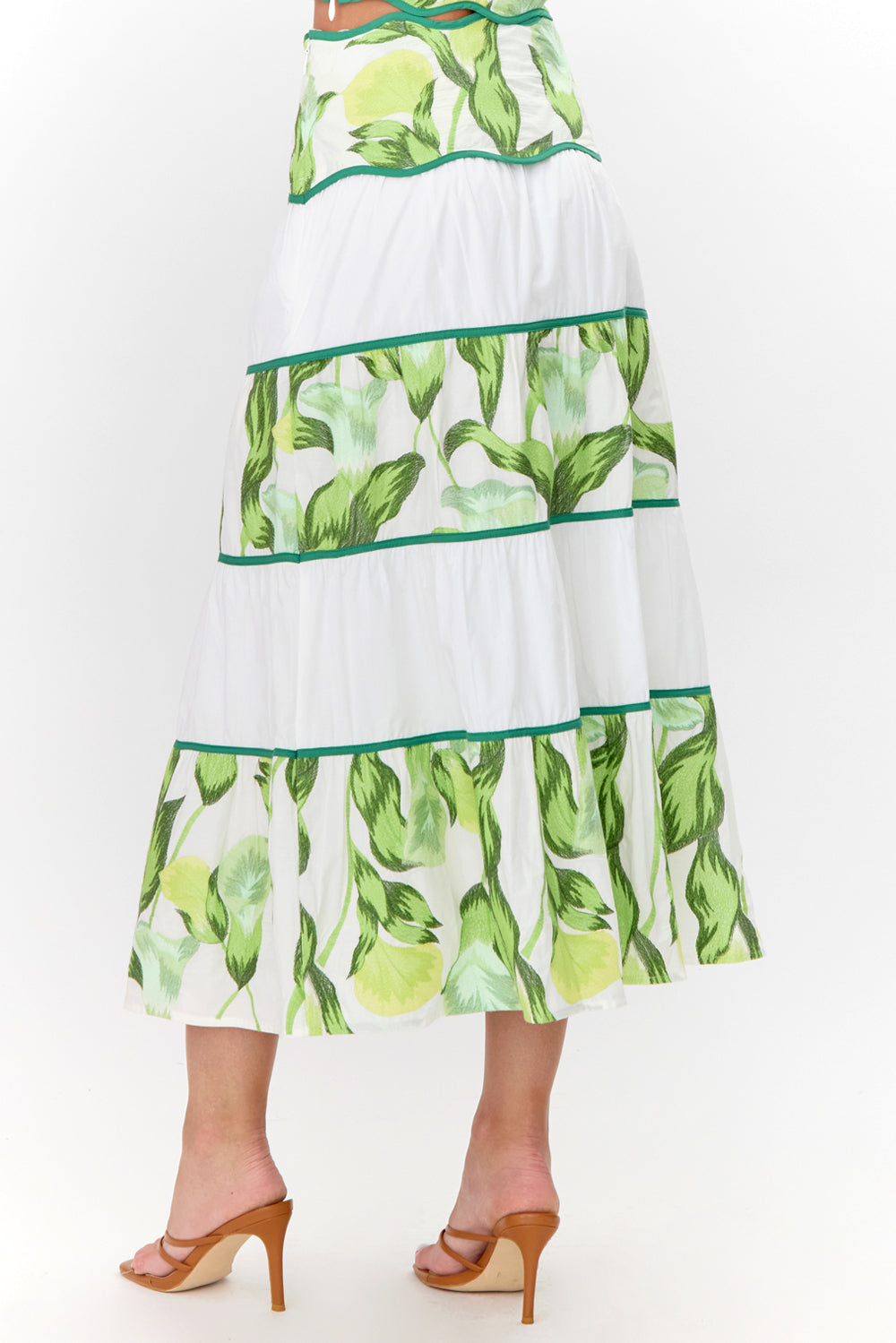 Back view of tiered, floral midi skirt.