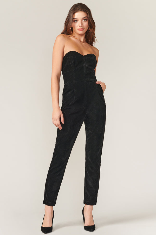 Black strapless velvet jumpsuit with pockets